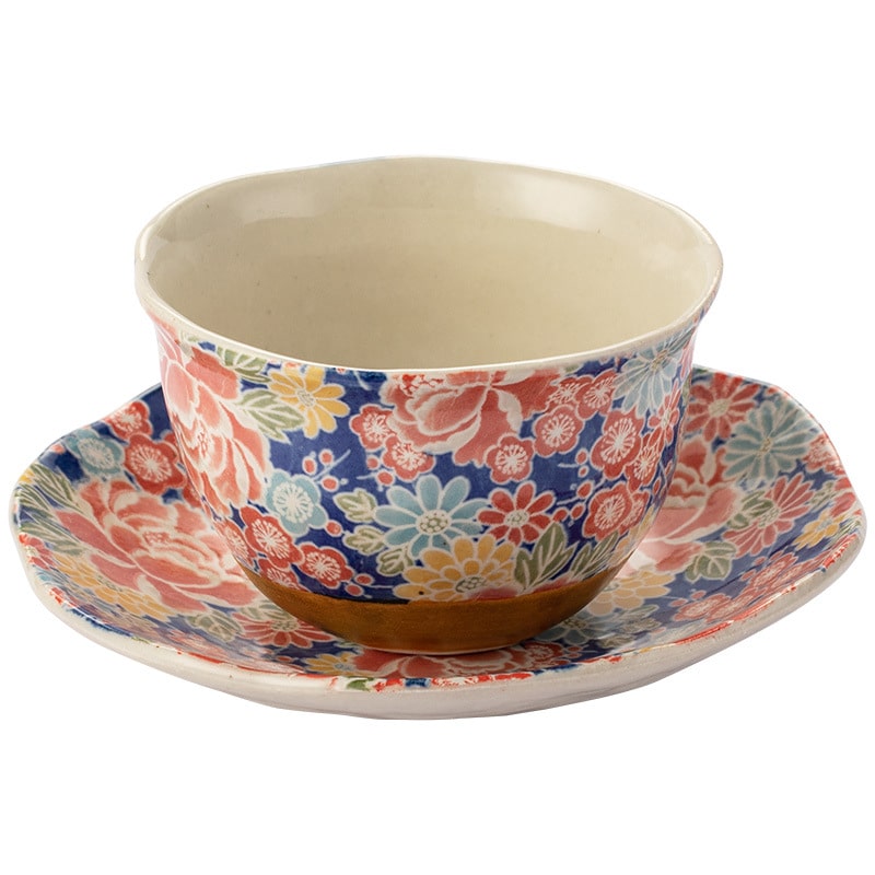 Collection of unique ceramic cup and saucer sets on wooden shelves