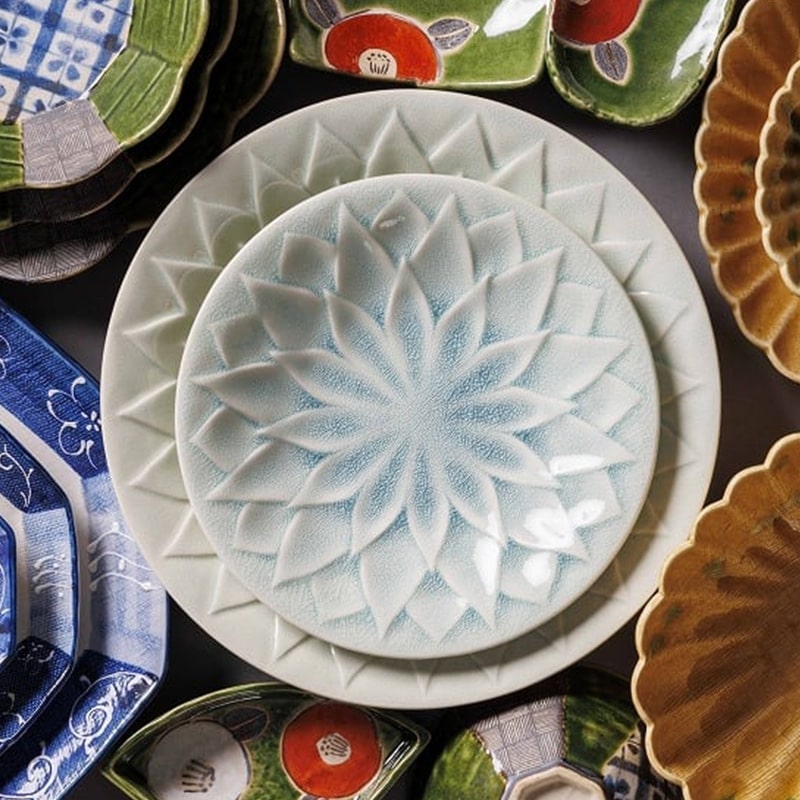 Close-up of artisan ceramic plate with intricate floral pattern