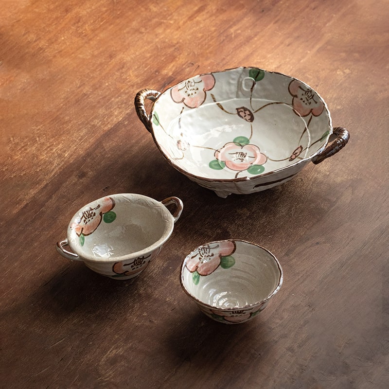 Japanese ceramic tableware set with hand-painted floral design.