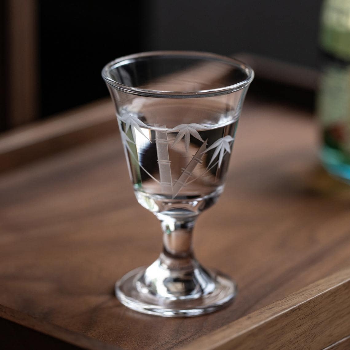 Hand-etched crystal wine glass with bamboo design