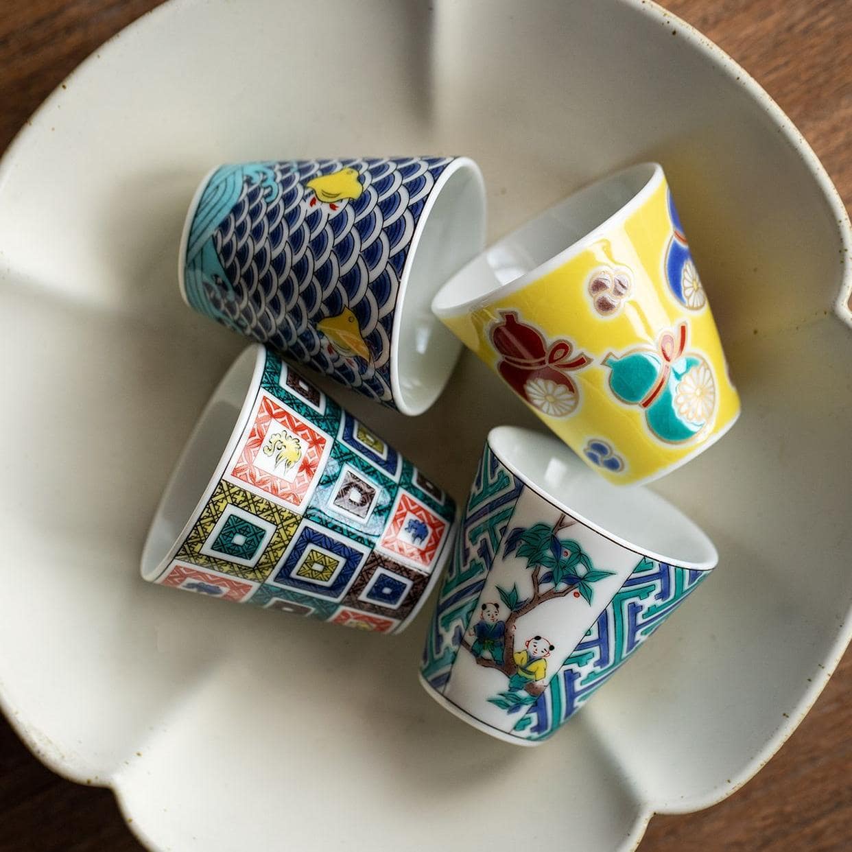 Close-up of a traditional Japanese sake cup with geometric design