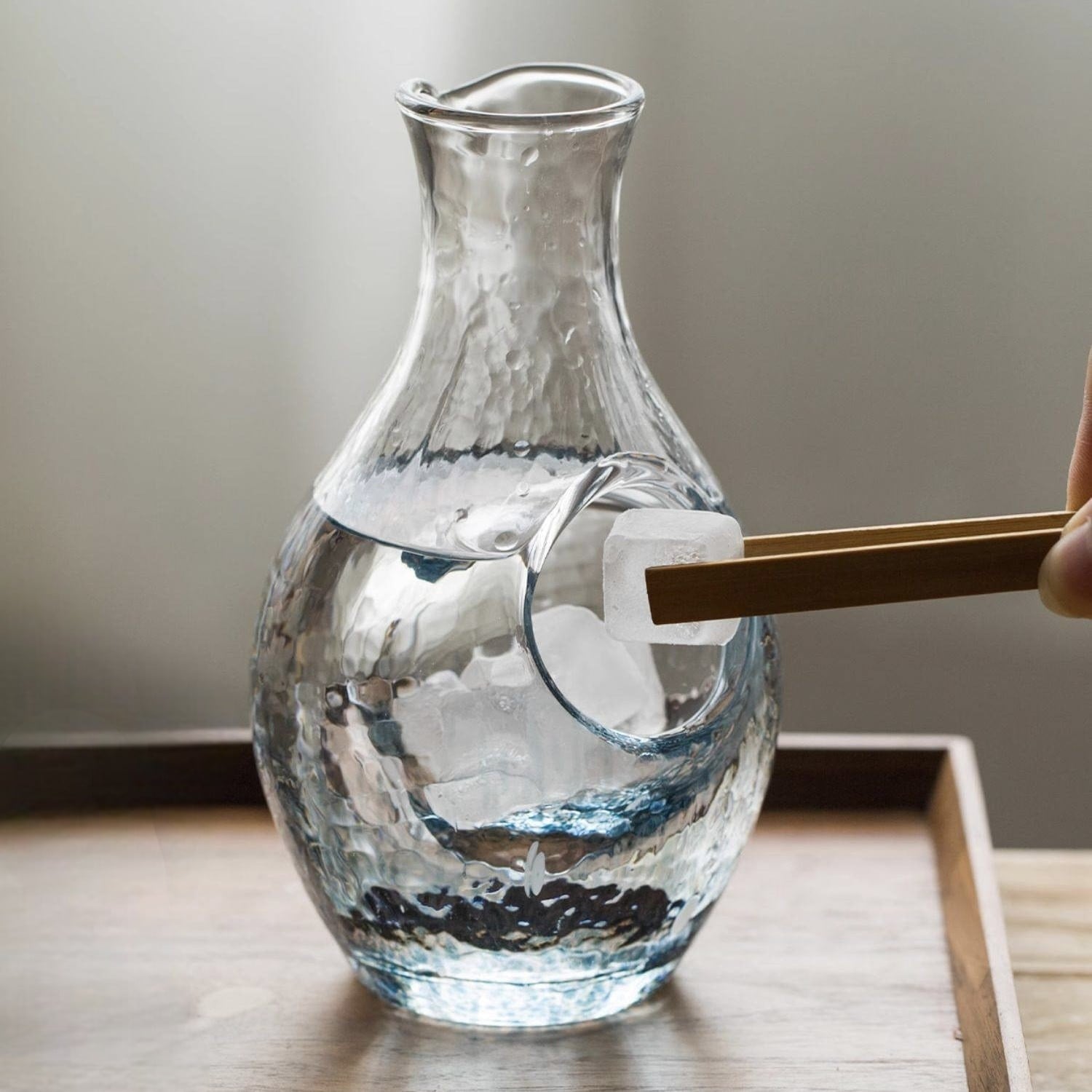 Hand-blown sake drinking set with a modern design.
