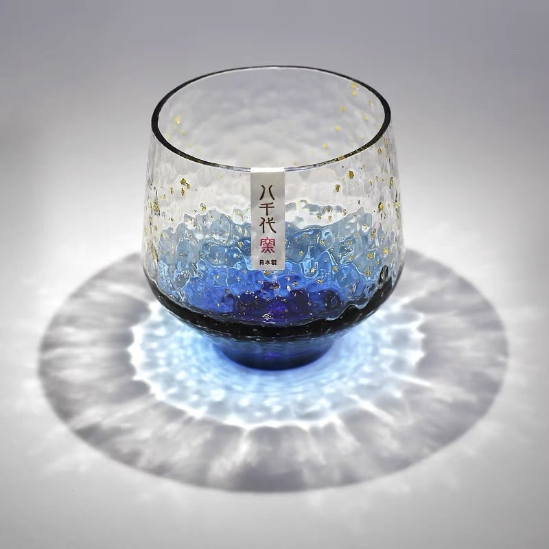 Luxurious sake set with unique designs and a contemporary aesthetic.
