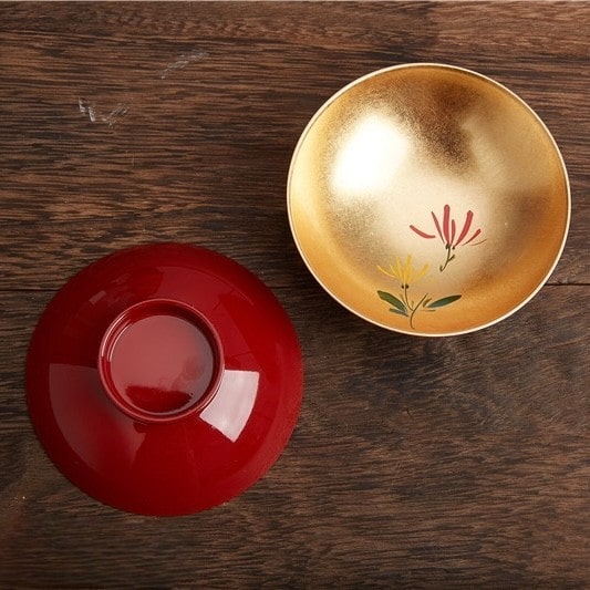 Set of Japanese gold lacquer sake cups perfect for gifting or ceremonial use.
