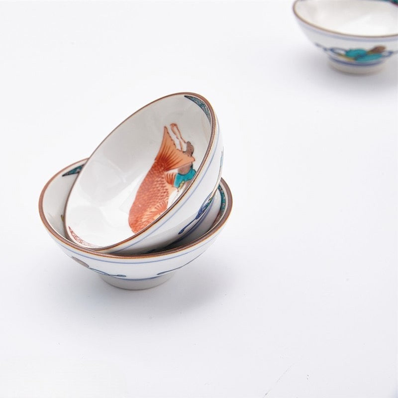 Premium porcelain tea cups with intricate hand-painted artwork.
