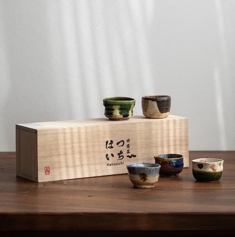 Artistic ceramic tea cup collection with textured designs.
