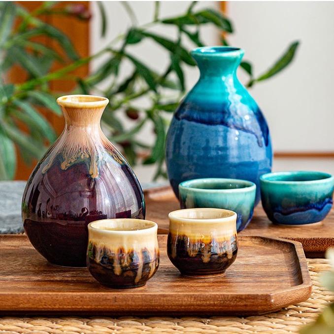 Handcrafted artisan sake set with two carafes and cups