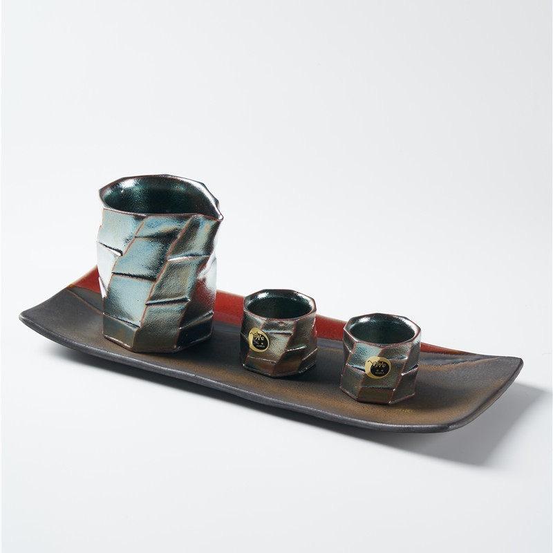 Artistic ceramic tea set with bold angular design