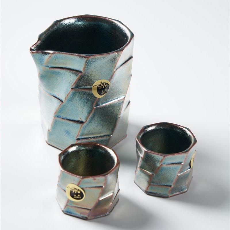 Handcrafted geometric glazed Japanese tea set close-up