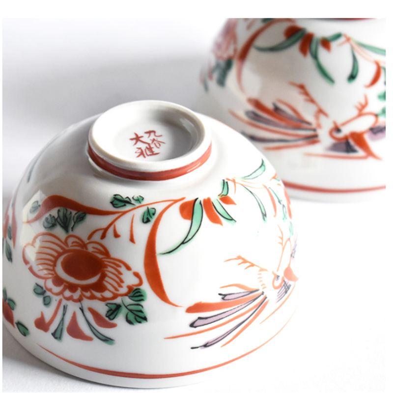 Durable hand-painted rice bowls with vibrant designs.