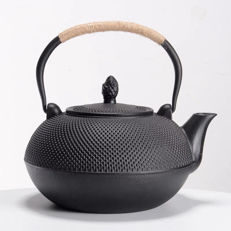 Premium black cast iron tea pot showcasing its durable design.