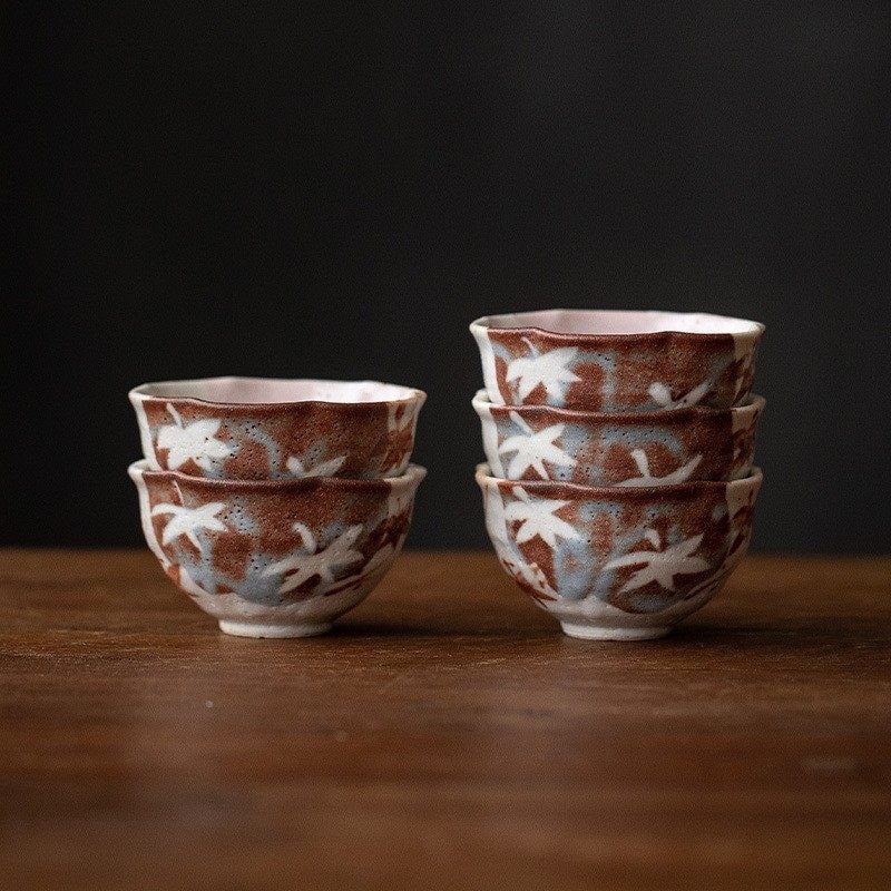 Handcrafted pink and brown ceramic tea cups