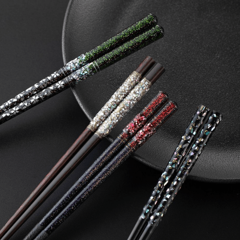 Premium chopstick set displayed on a black surface