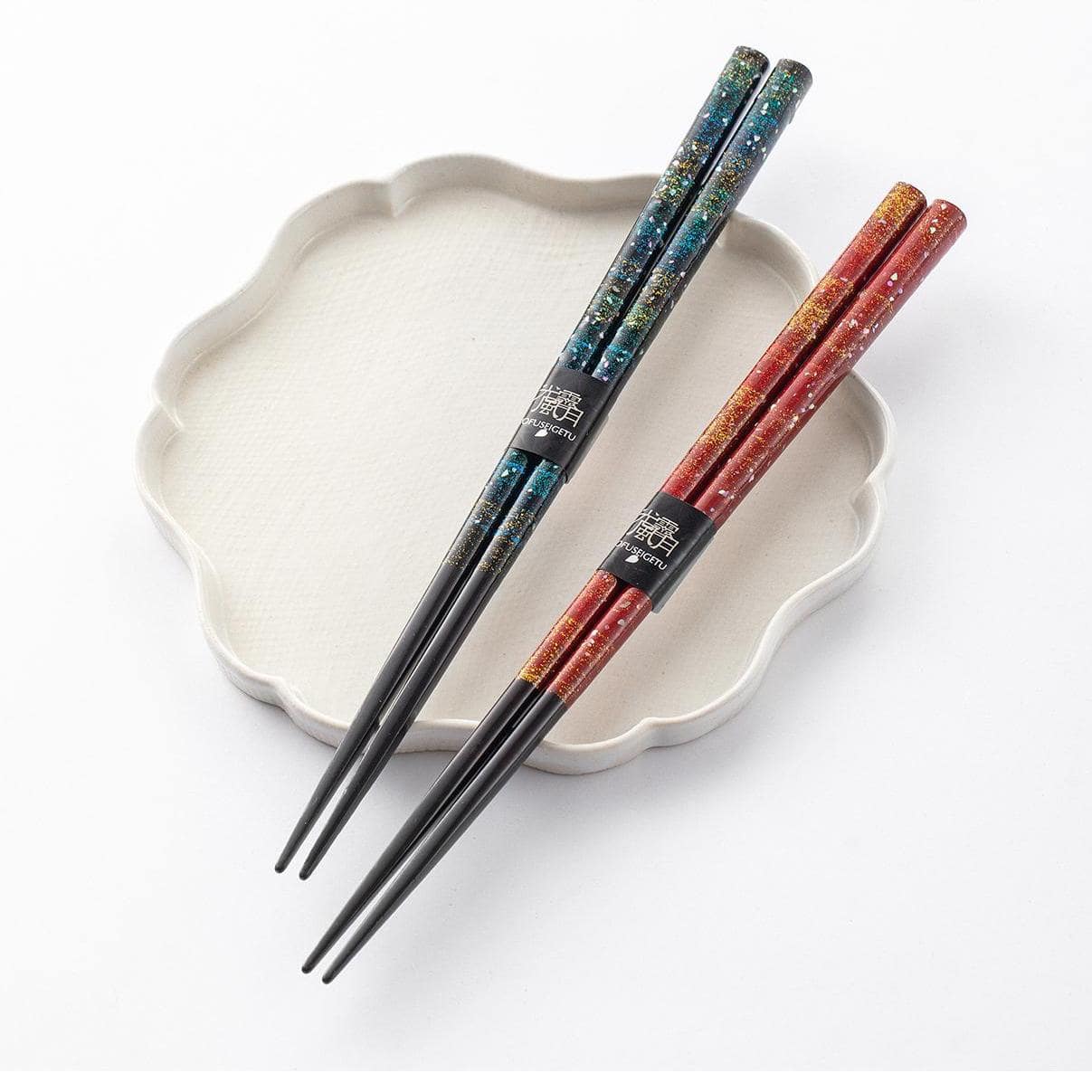 Japanese chopsticks with vibrant red and blue glitter designs