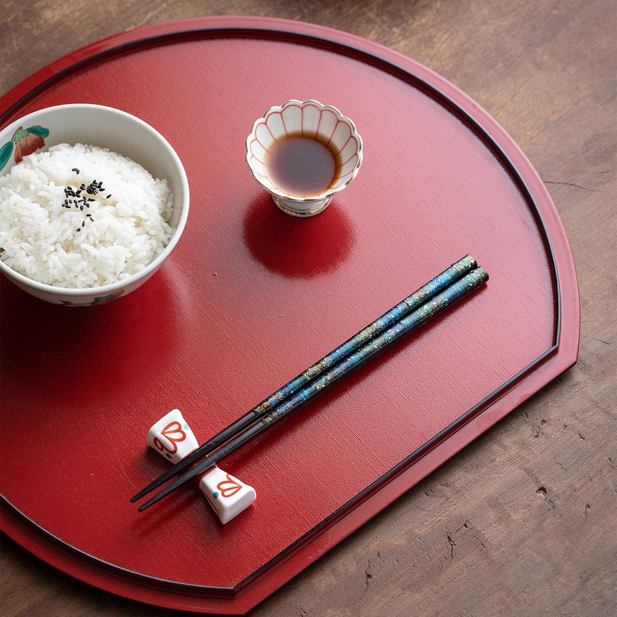 Japanese chopsticks with vibrant red and blue glitter designs