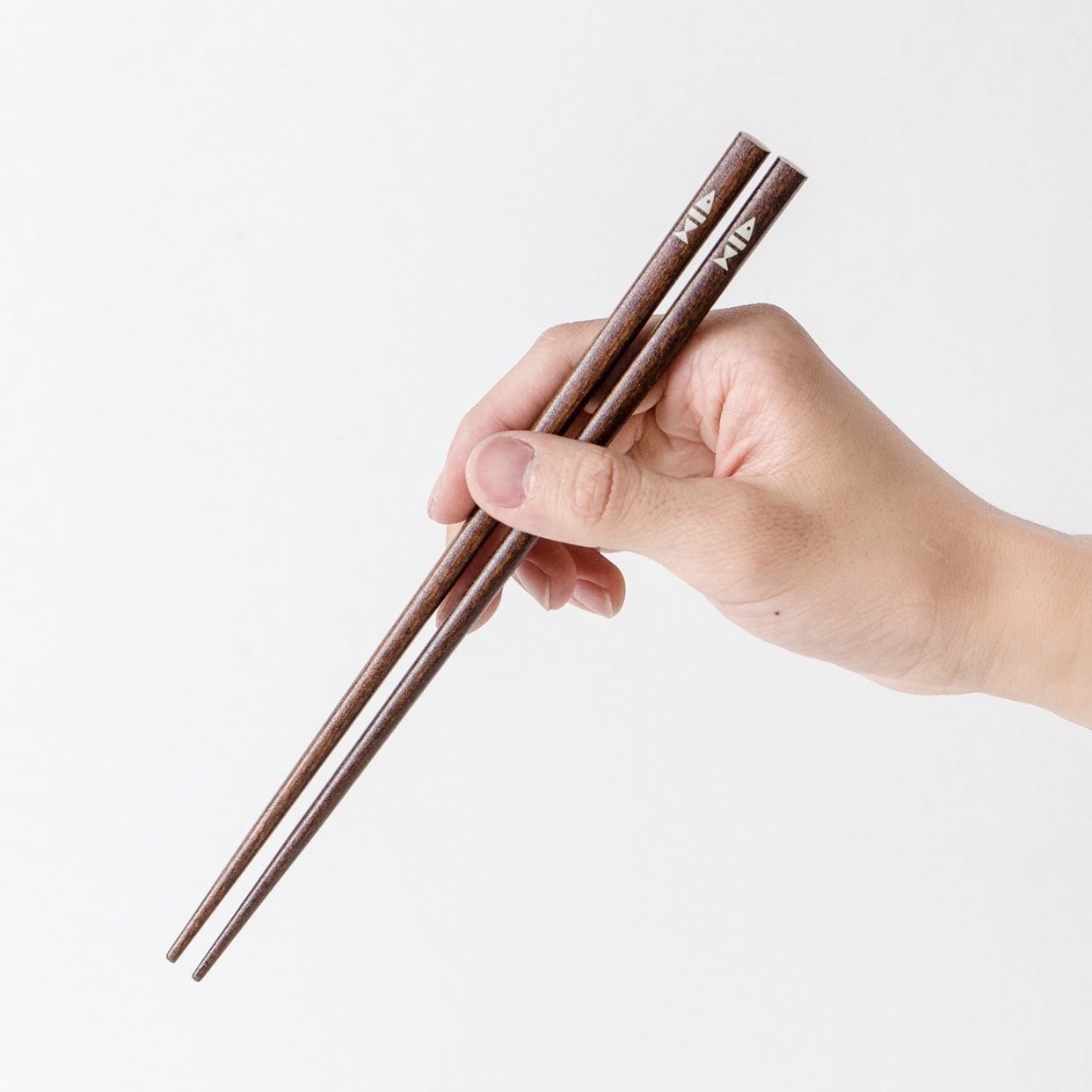 Minimalist wooden chopsticks in assorted colors