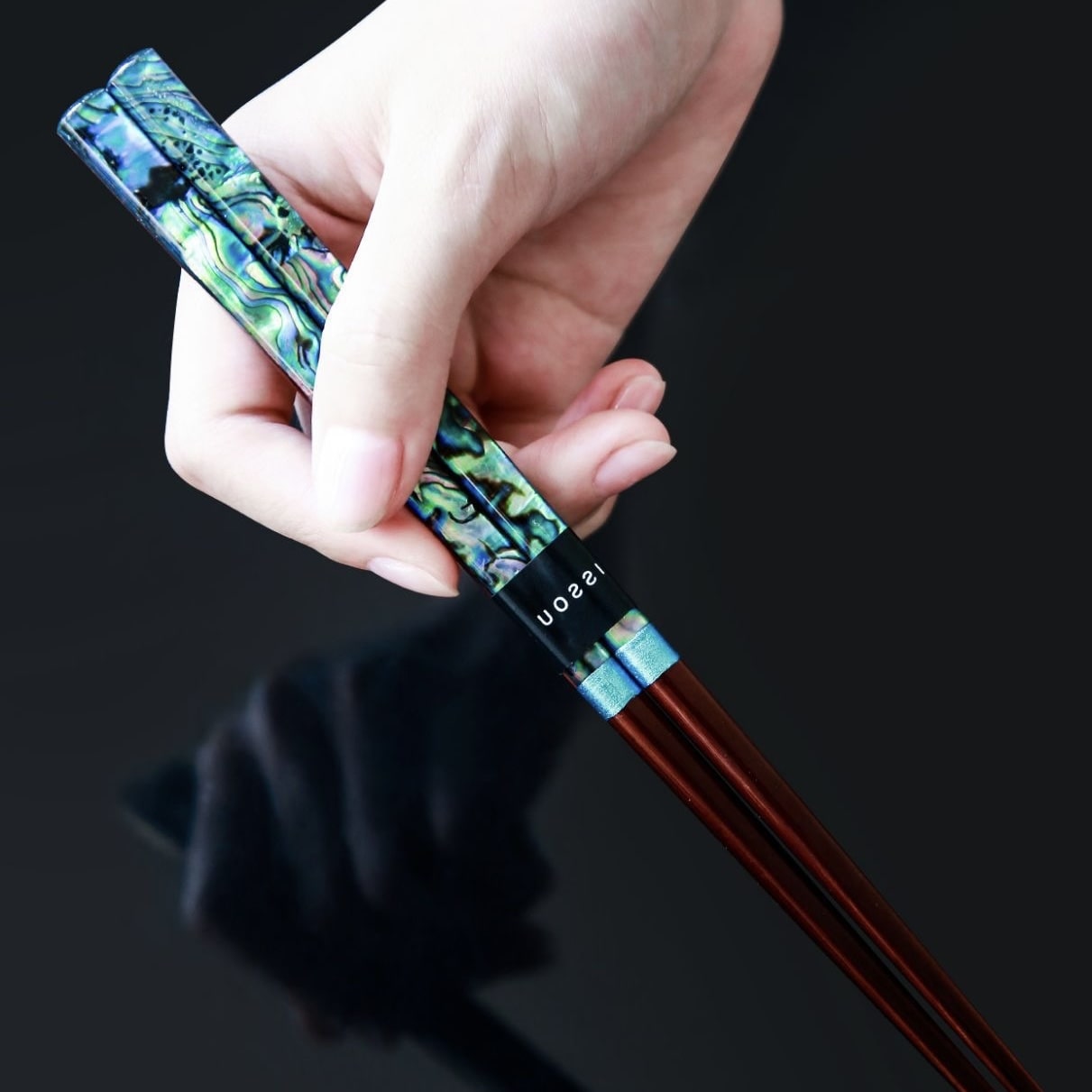 Close-up of luxury handmade shell-pattern chopsticks