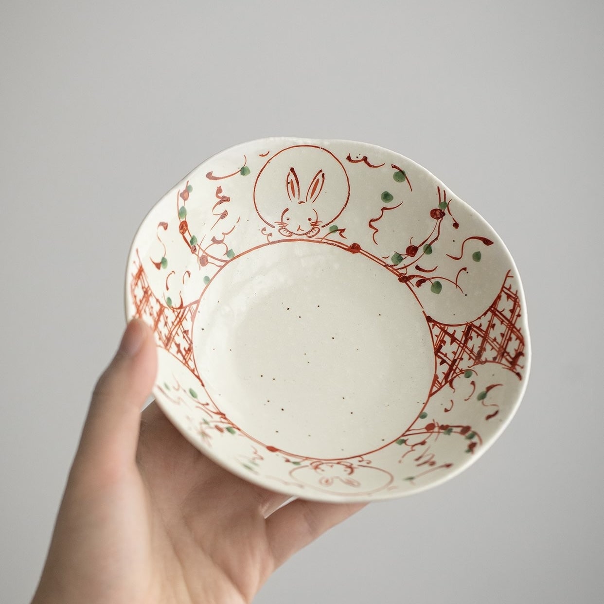 Set of rabbit-themed ceramic bowls presented in an elegant gift box