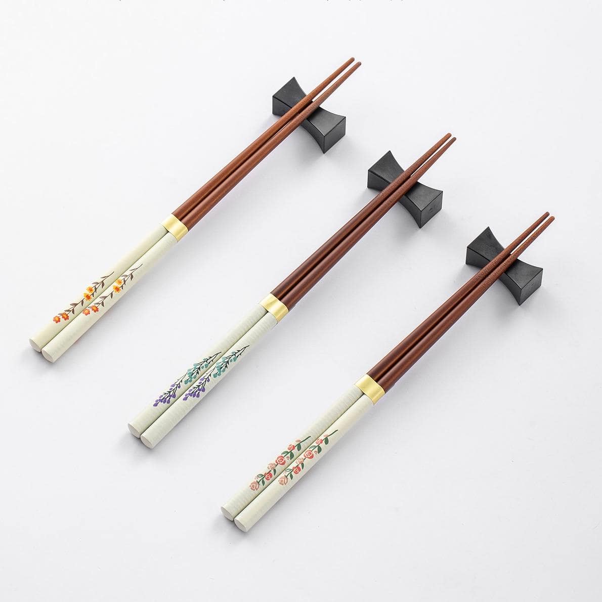 Set of wooden chopsticks with intricate floral designs