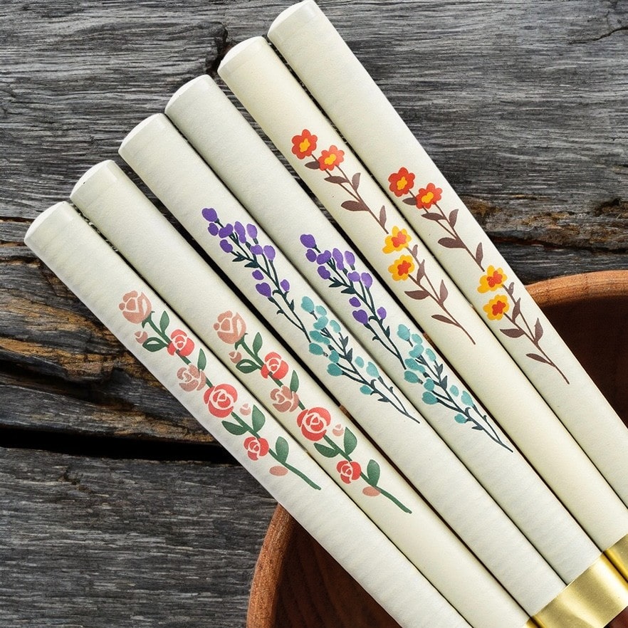 Eco-friendly chopsticks with vibrant floral patterns on display