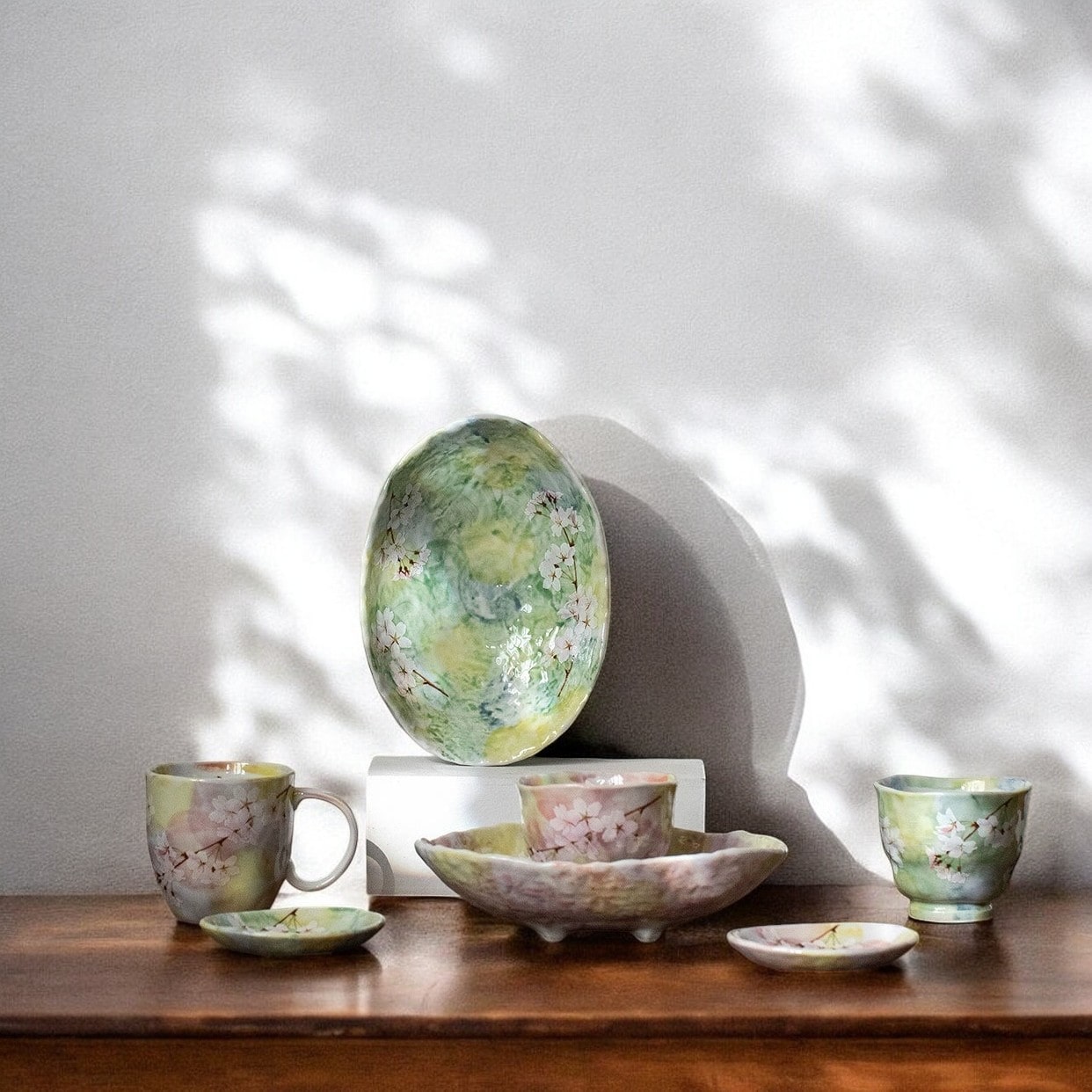 Elegant cherry blossom-themed mugs and bowls