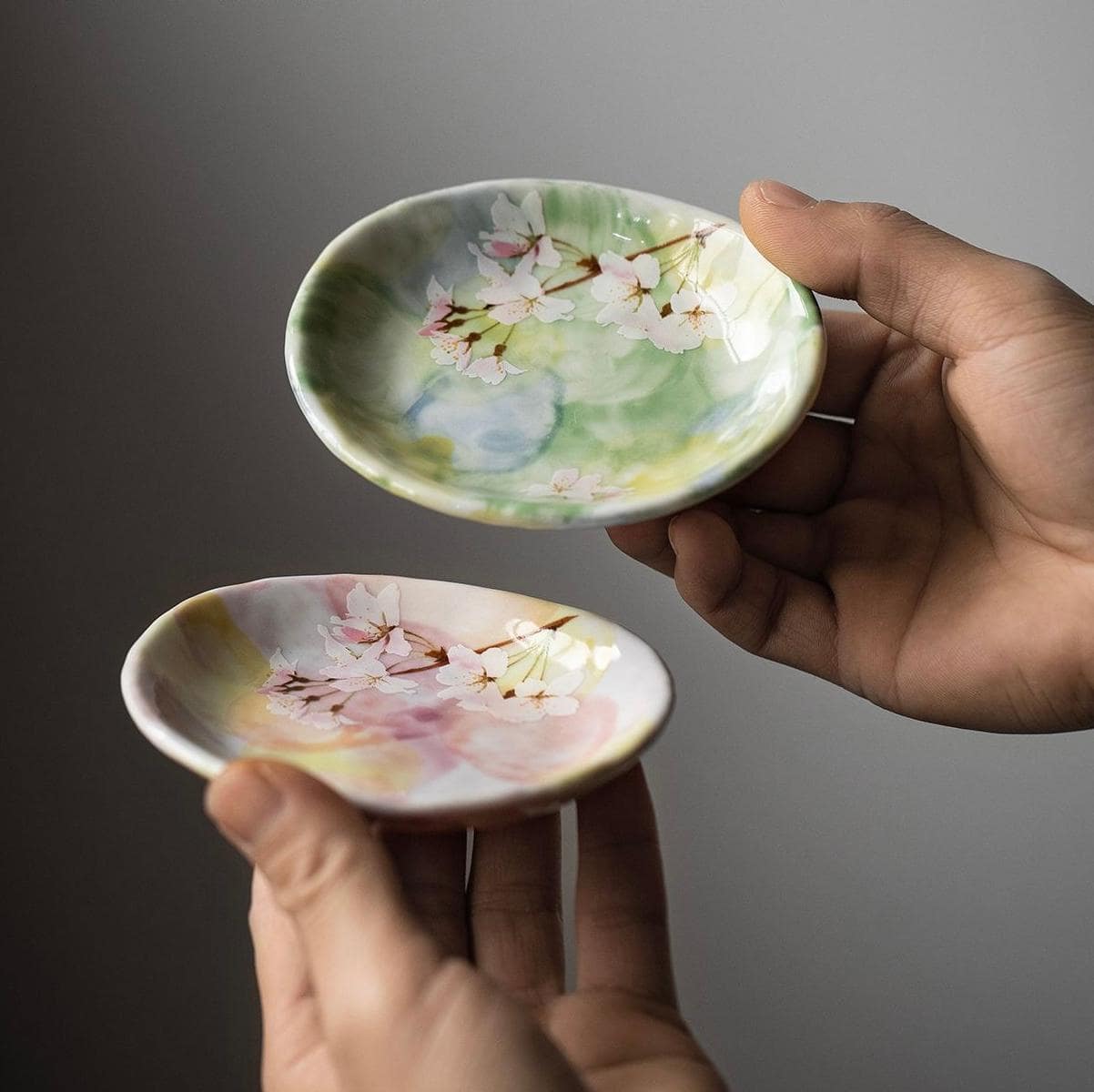 Handcrafted floral dinnerware plates and bowls close-up