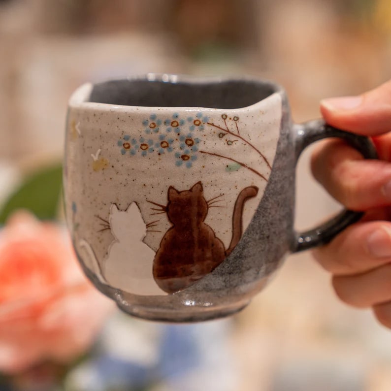 Unique speckled ceramic cat mug for tea and coffee enthusiasts