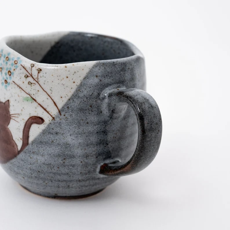 Unique speckled ceramic cat mug for tea and coffee enthusiasts