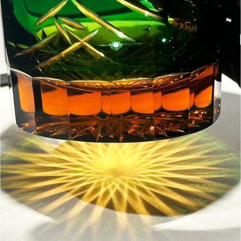 Mount Fuji whiskey glass with Edo Kiriko crystal cut design and vibrant blue-green palace-inspired motif.
