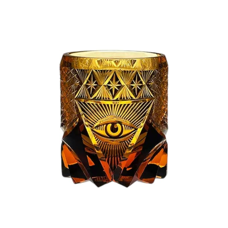 Eye of Providence whiskey glass with Edo Kiriko crystal craftsmanship and amber tones.
