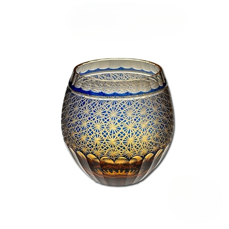 Handcrafted amber-blue Dragon Eye whiskey glass with Edo Kiriko chrysanthemum design.