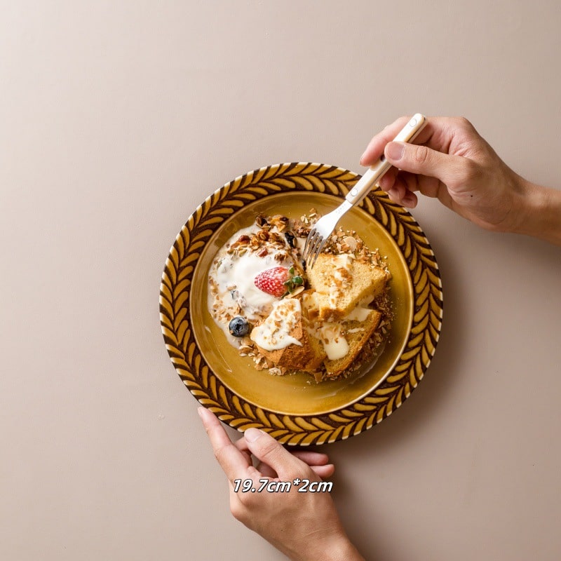 Side view of a vintage-inspired ceramic bowl with warm earth tones