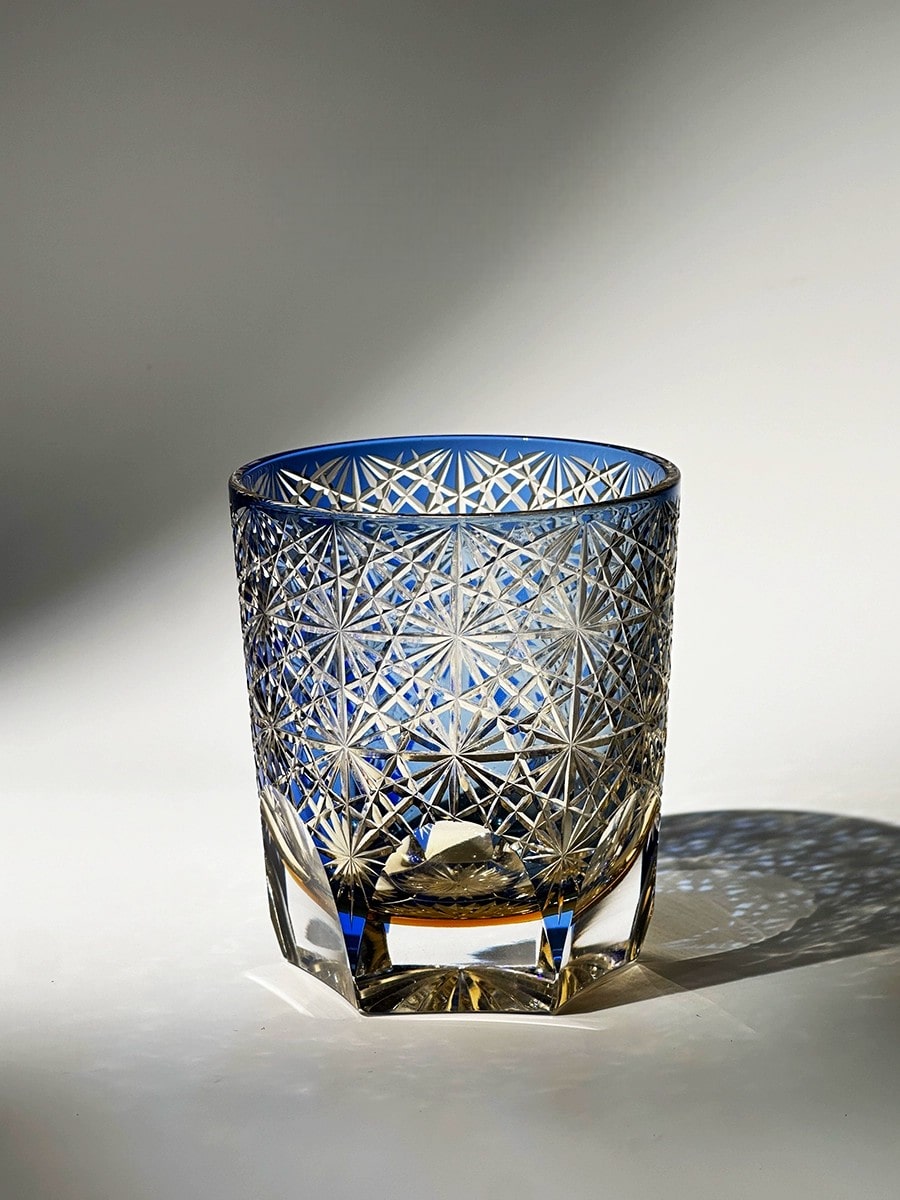 Blue daisy whiskey glass with Edo Kiriko crystal cut design in palace-inspired style.
