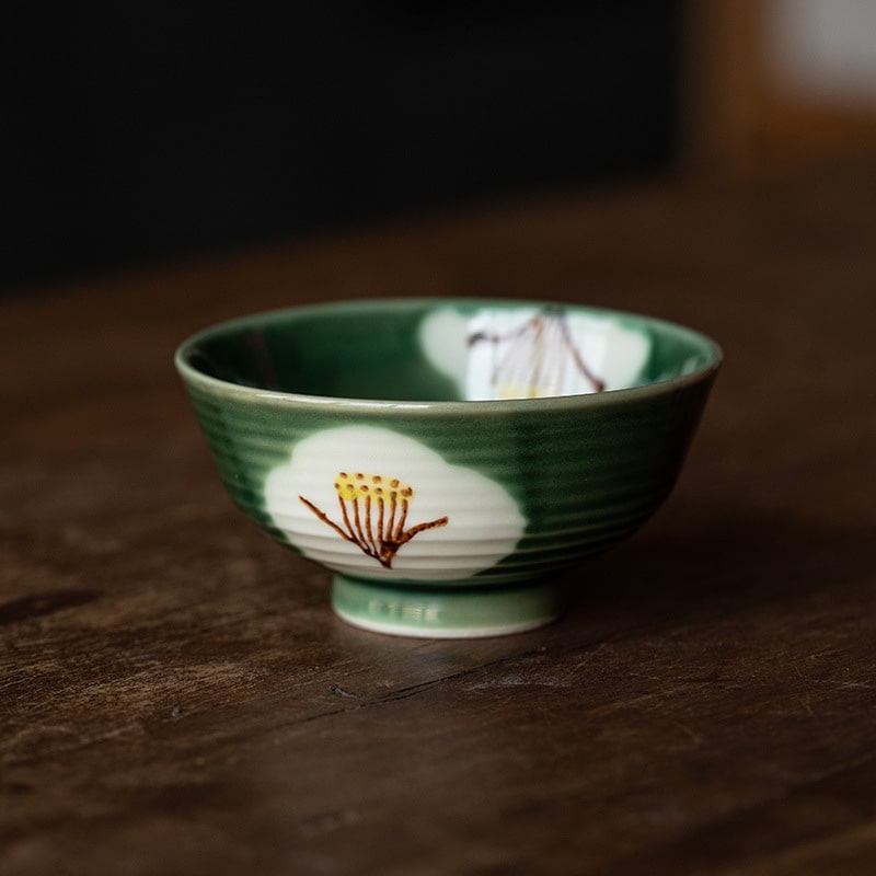 Elegant ceramic bowl set on rustic wooden table