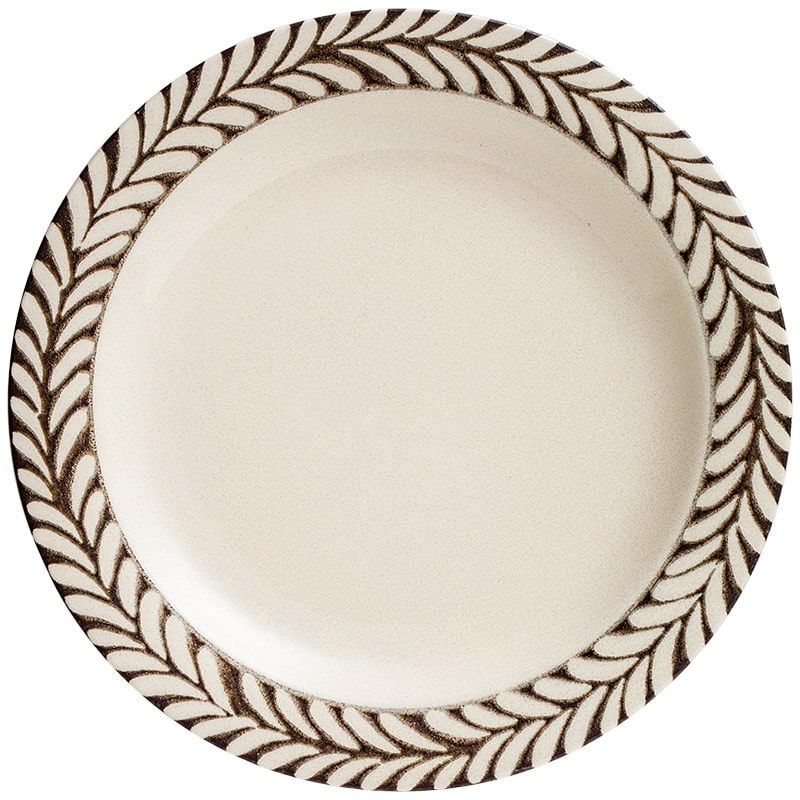 Elegant ceramic plate with leaf border design and dessert served