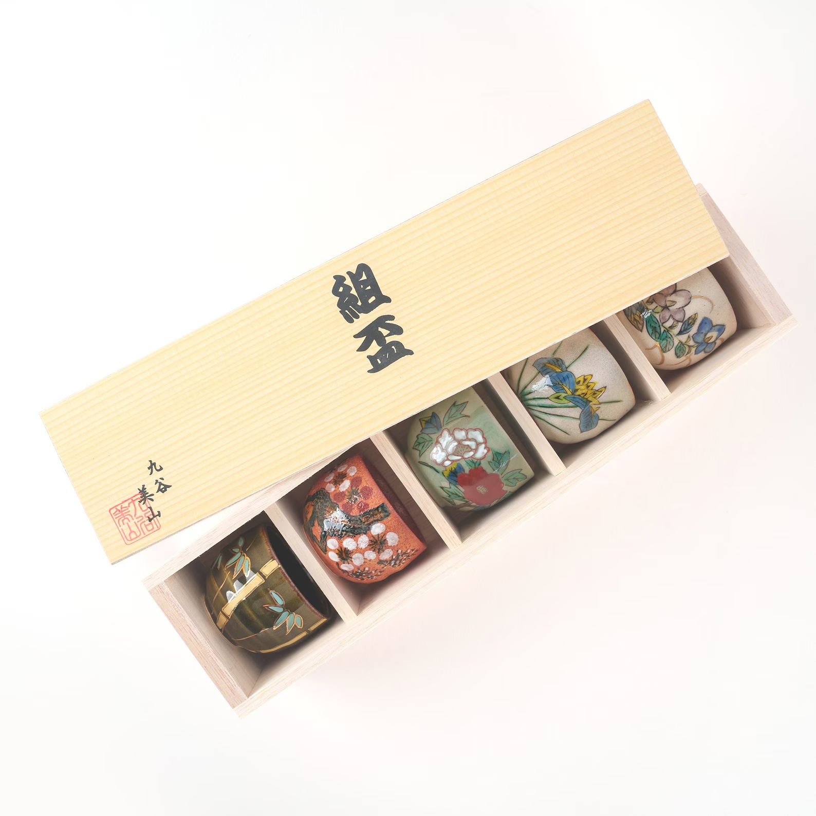 Hand-painted Japanese sake cup set featuring floral and nature motifs.
