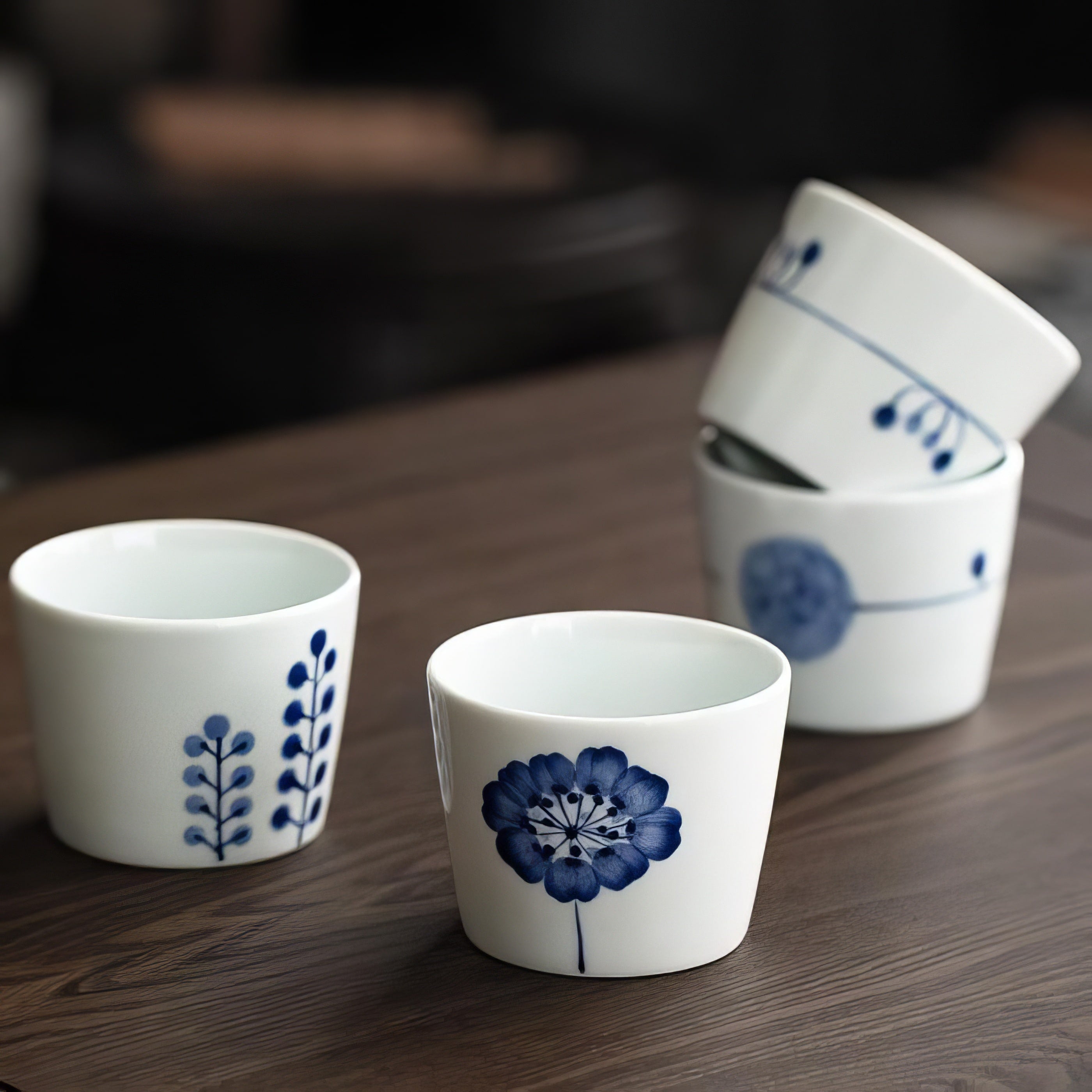 Close-up of the base of a porcelain tea cup with Japanese craftsmanship details.