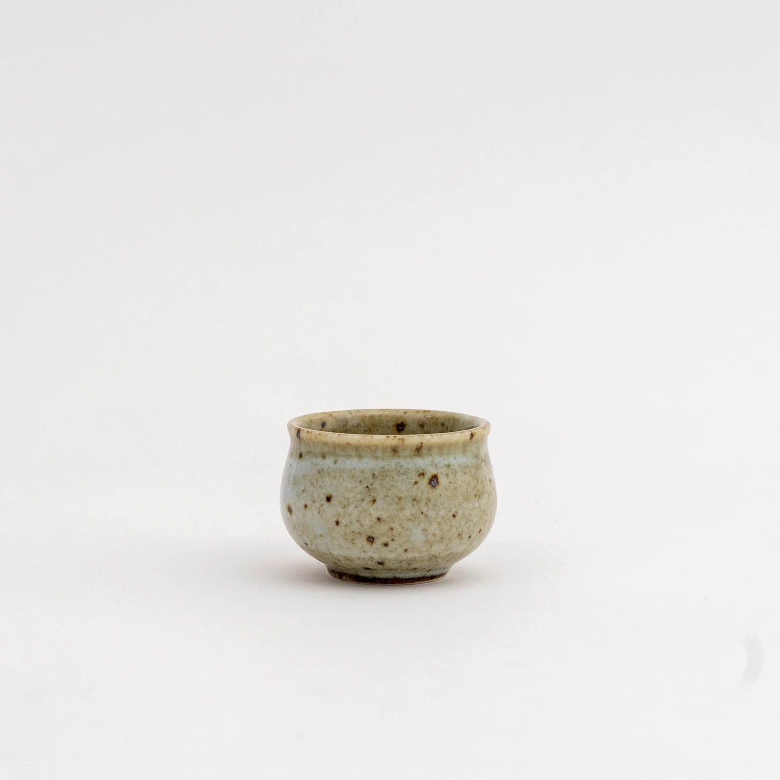 Handcrafted ceramic sake set with subtle earthy tones