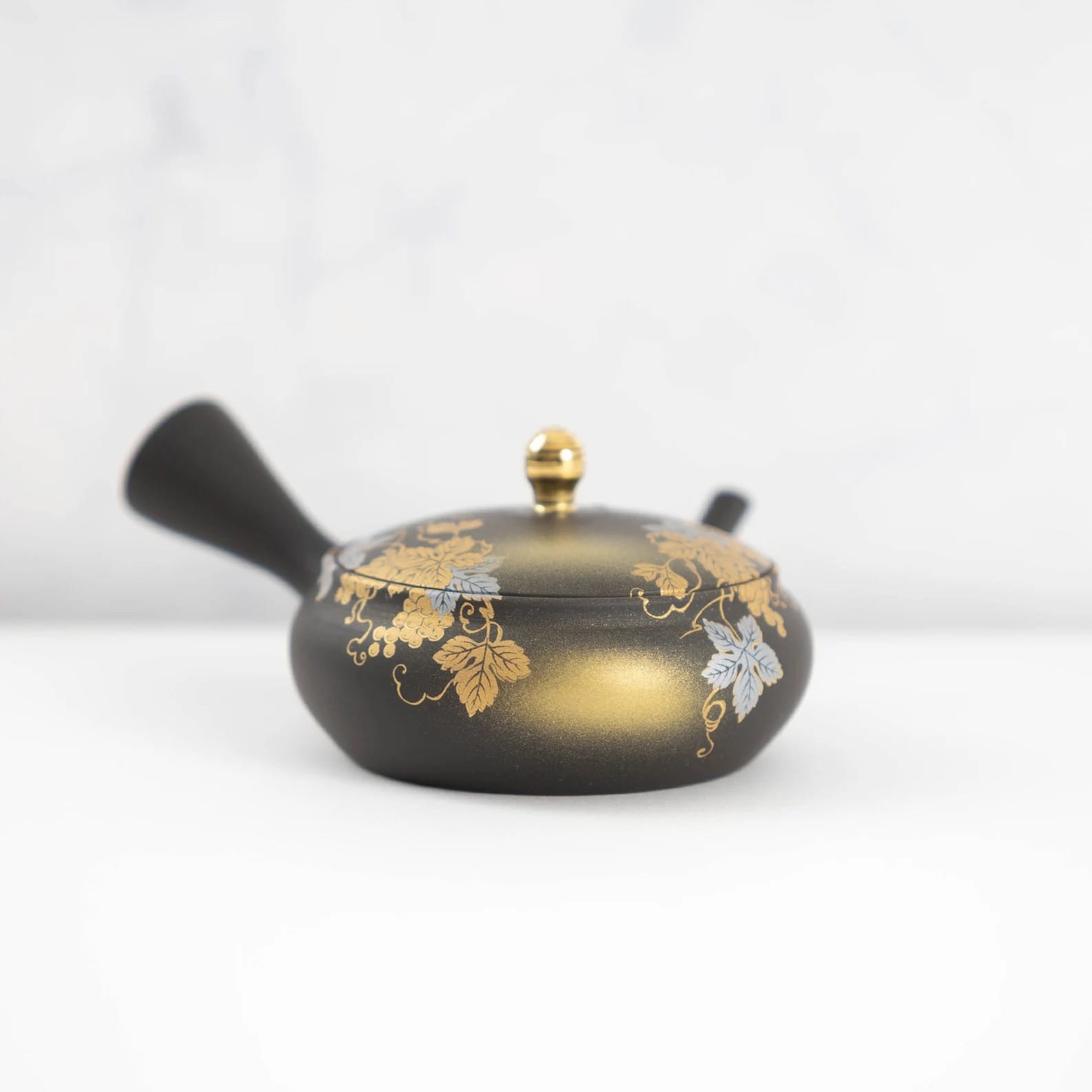 Close-up of Tokoname x Kutani Yaki teapot with floral details