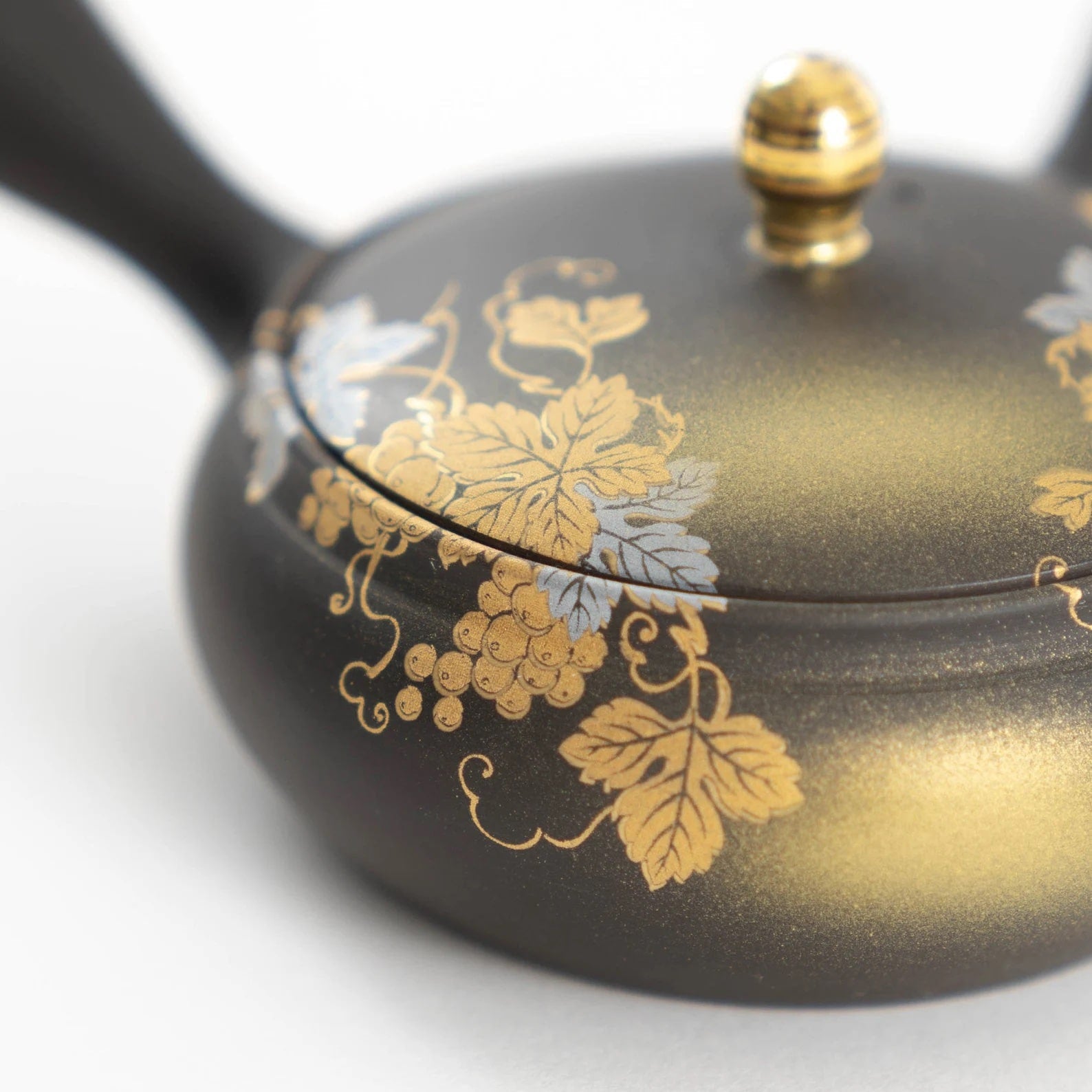 Close-up of Tokoname x Kutani Yaki teapot with floral details