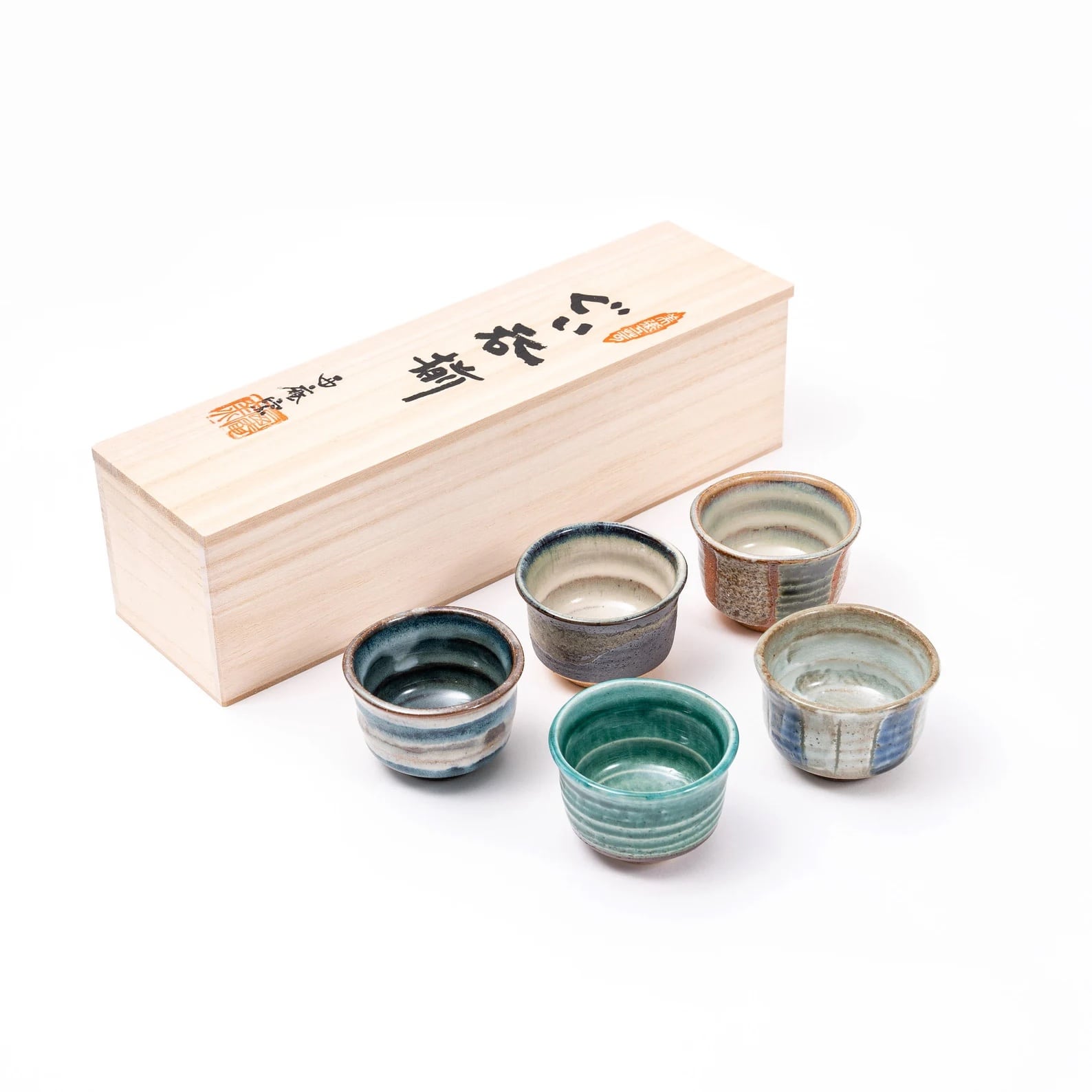 Luxury sake drinking set with unique handcrafted ceramic cups