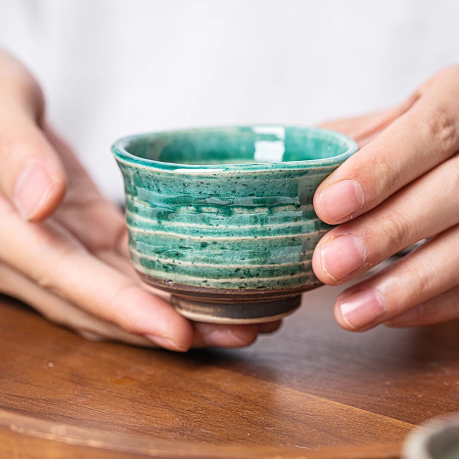 Luxury sake drinking set with unique handcrafted ceramic cups