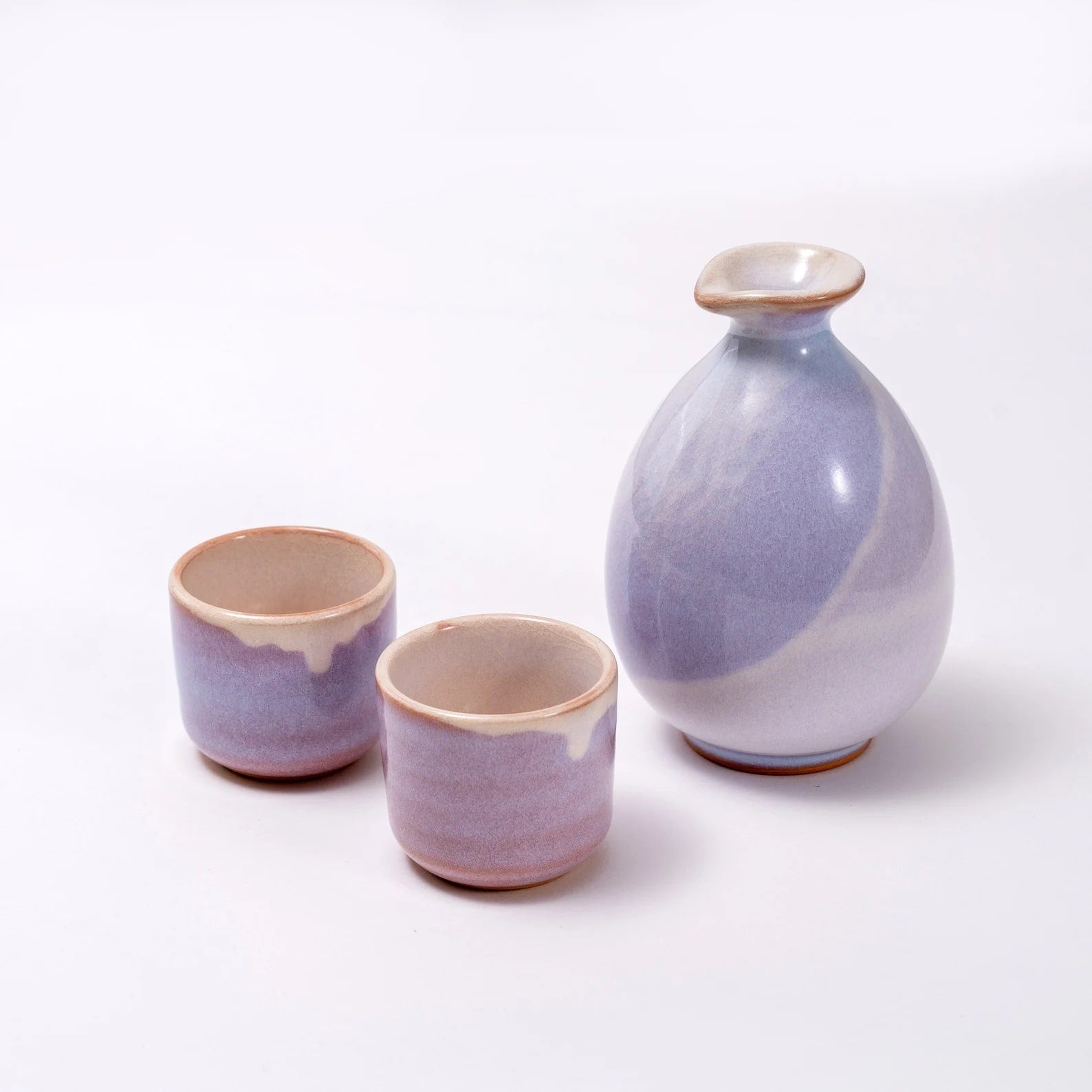 Premium sake sets arranged elegantly on a wooden tray