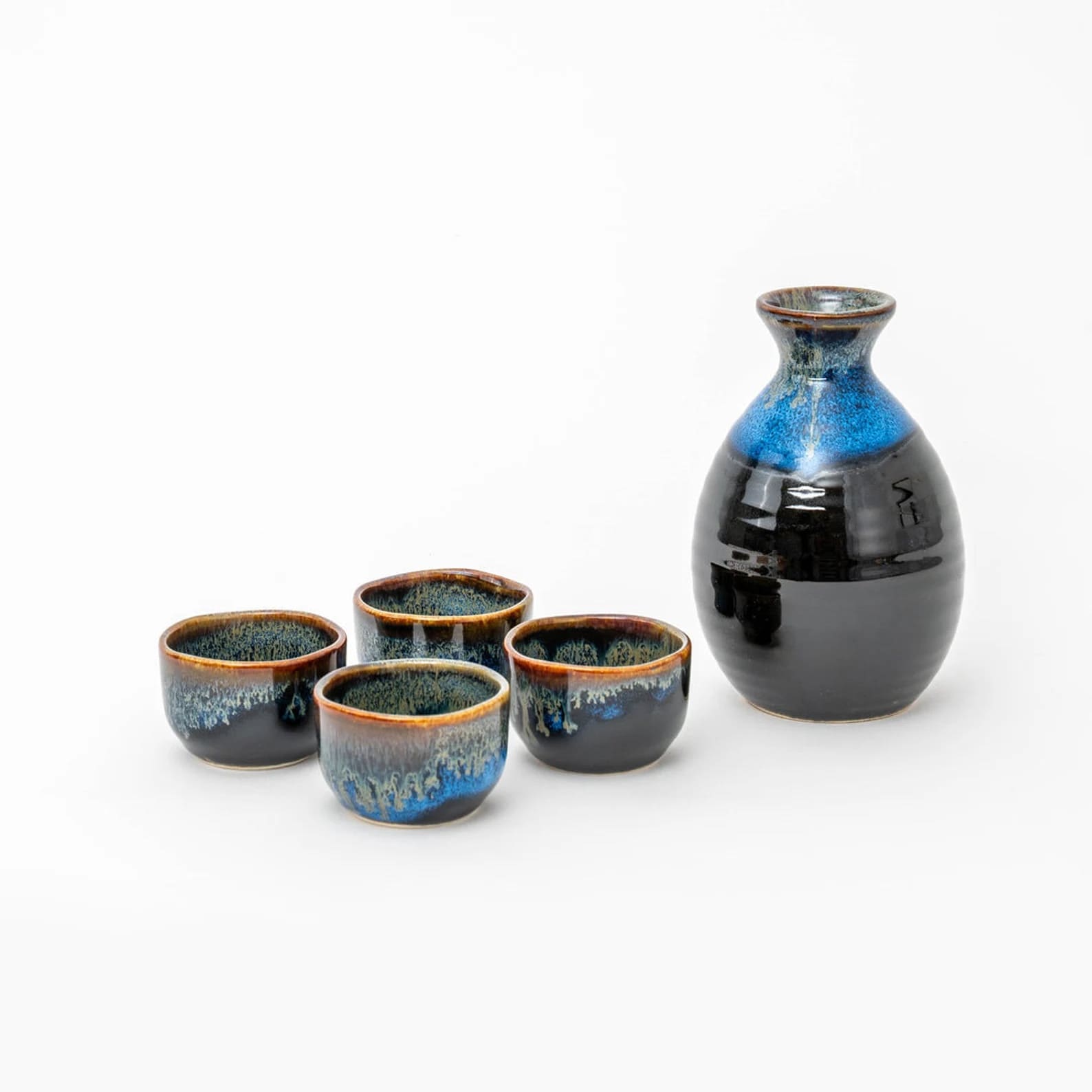 Handcrafted ceramic sake set with subtle earthy tones