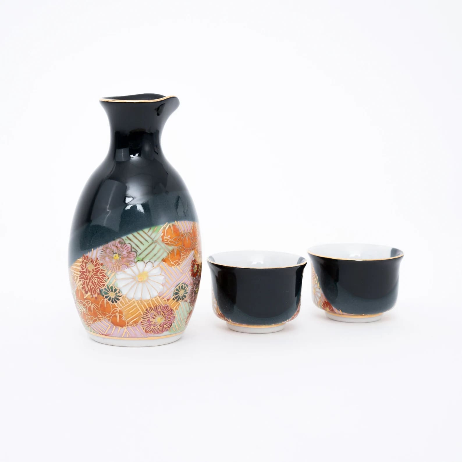 Hand-painted artisanal sake set with intricate floral patterns