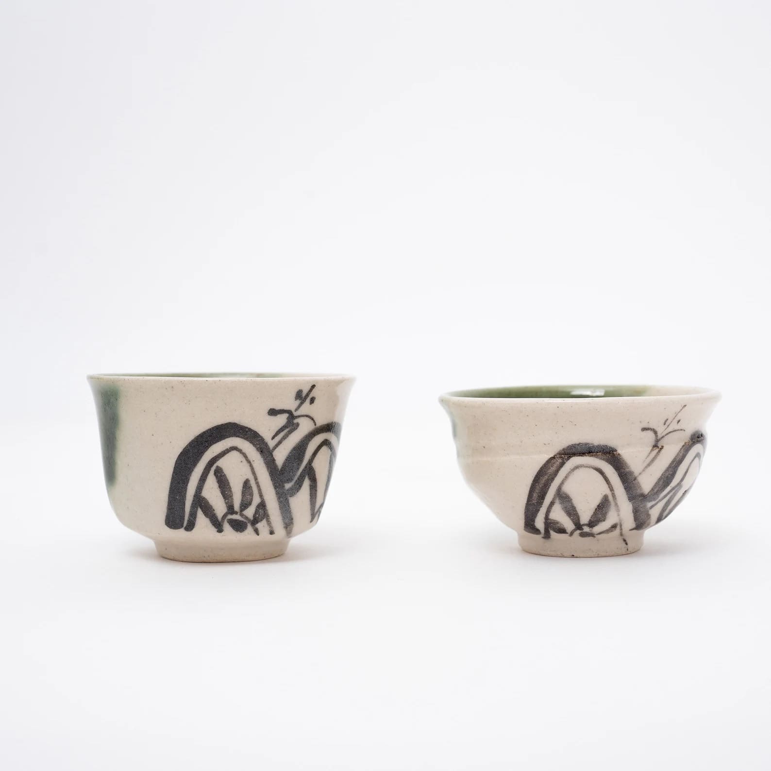 Traditional Japanese sake drinking set displayed on a neutral background