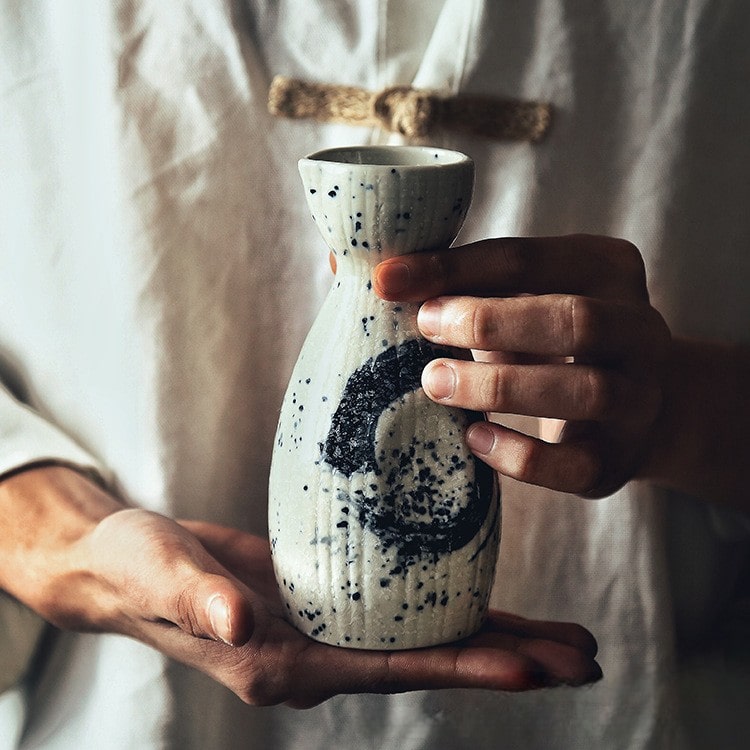 Handcrafted Japanese-style sake set with unique abstract designs.
