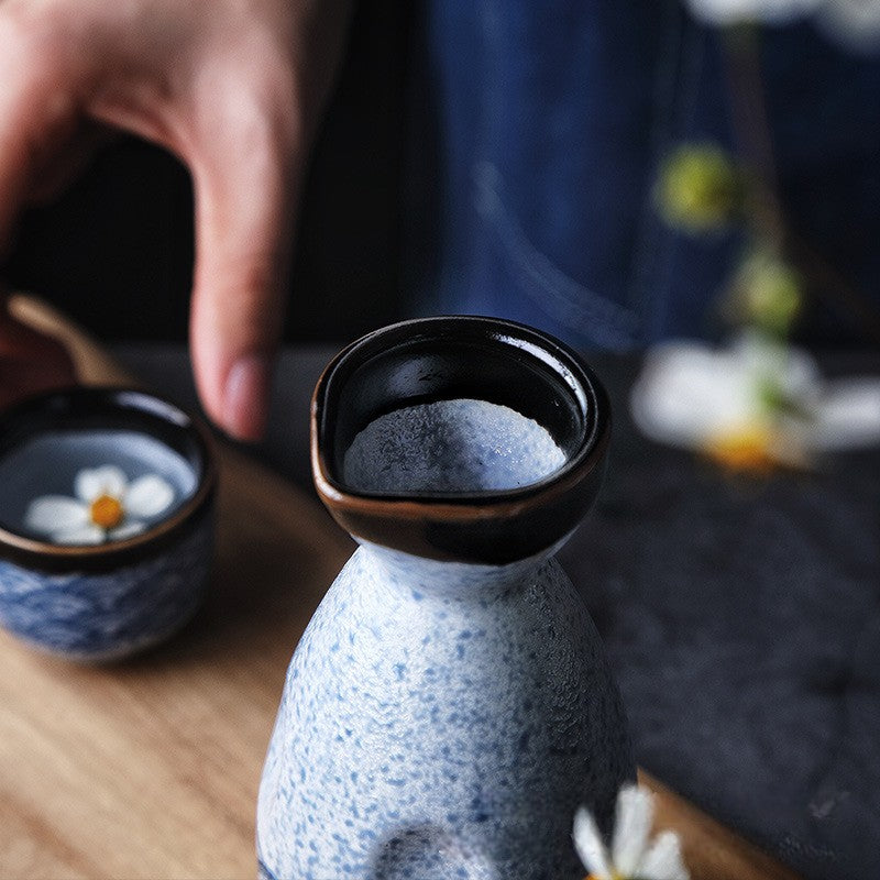 Full sake drinking set arranged elegantly for display.
