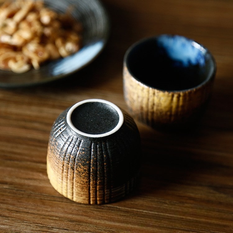 Japanese-style sake set displayed with an elegant minimalist backdrop.
