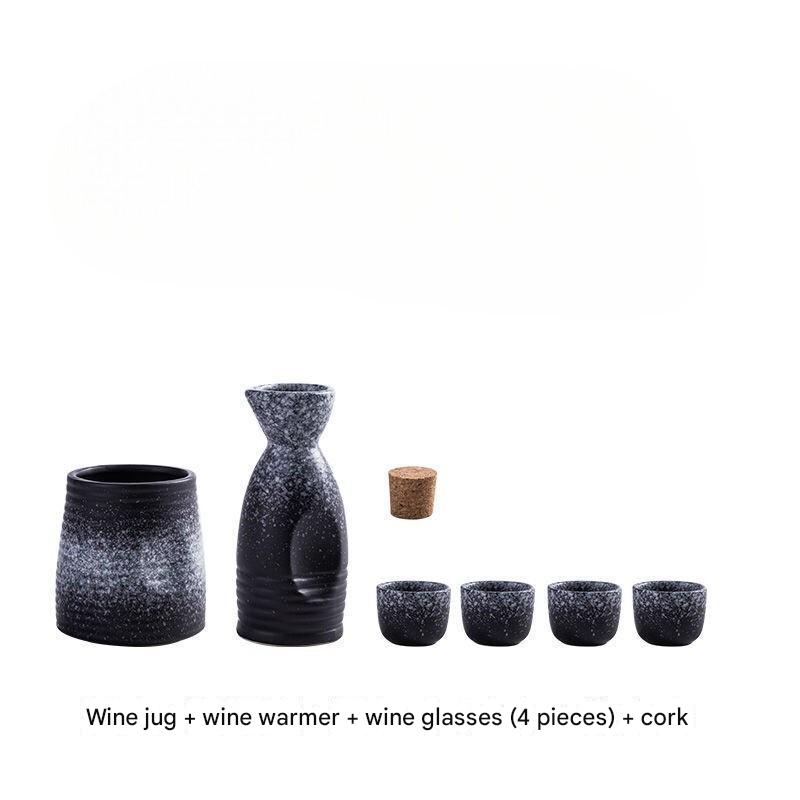 Handcrafted ceramic sake cups with minimalist design.
